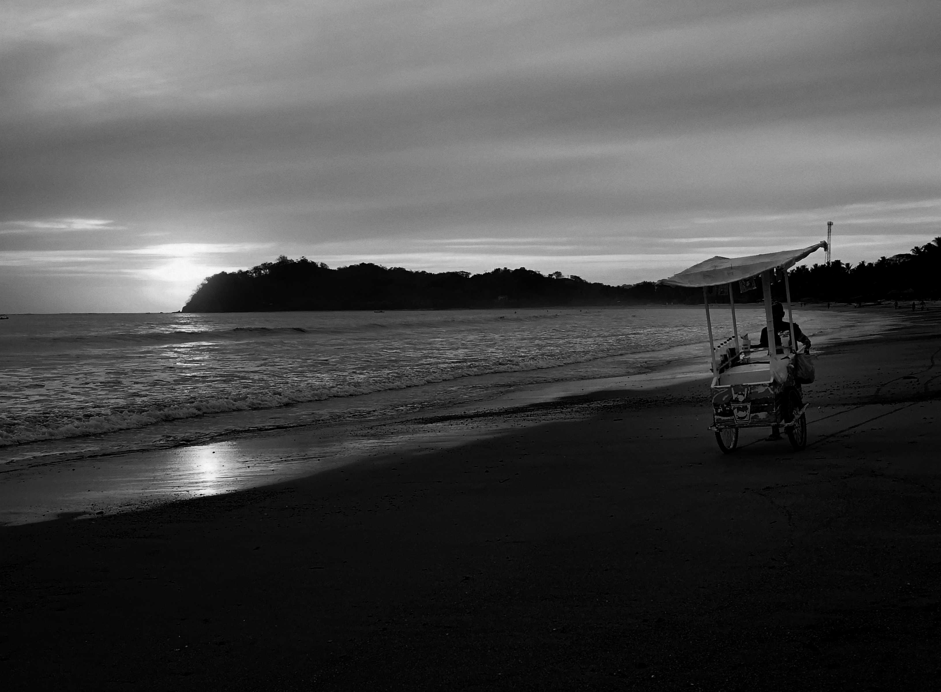 Playa Sámara at dusk, when the beach bars start filling up